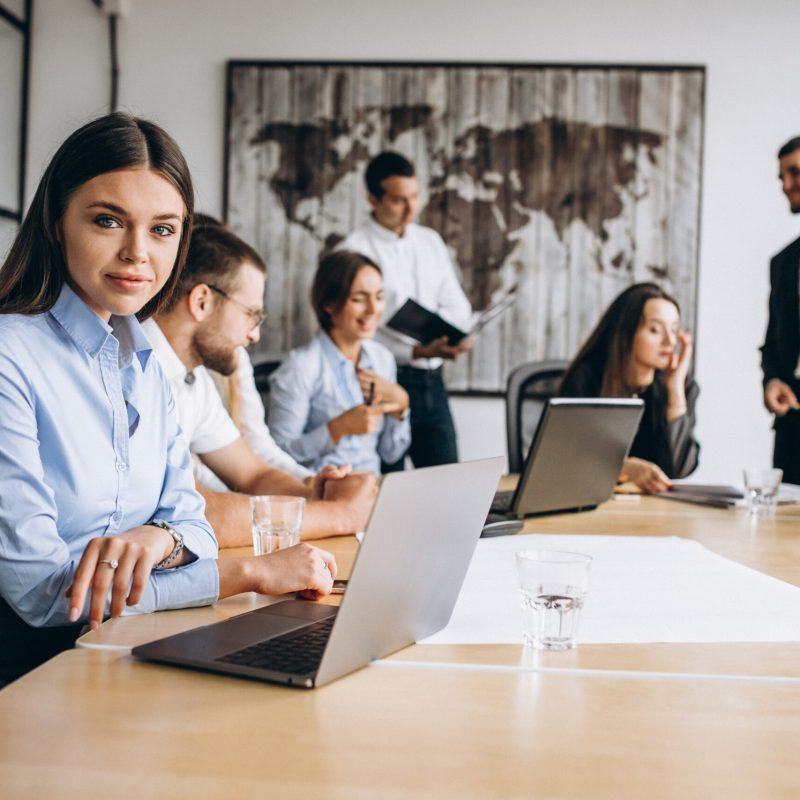 Group of people working out business plan in an office